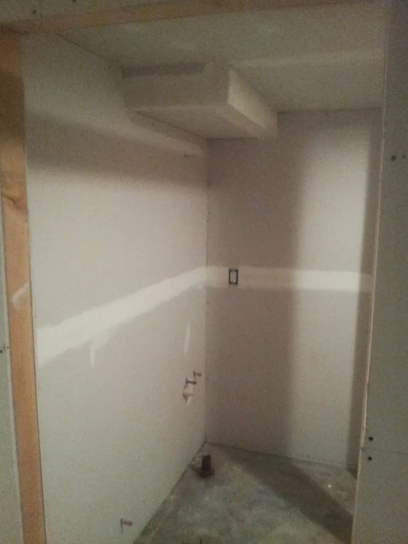 Taped and mudded drywall joints sanded smooth for paint