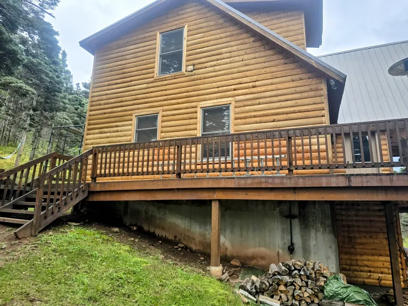 Log home exterior after a full restoration and re-stain
